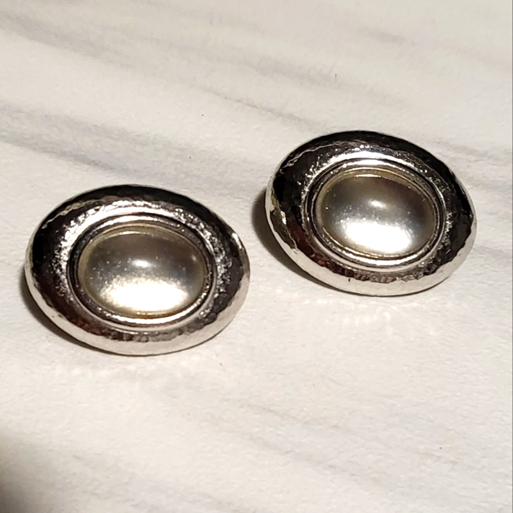 Vintage Monet clip-on earrings, clear gem appears silver, silver‎ tone